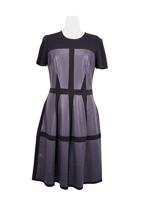 Authentic BCBG Max Azria black and slate grey midi dress with faux leather panel detailing, short sleeves, and flared skirt silhouette.