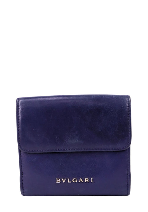 Bvlgari Serpenti cobalt blue leather wallet with iconic snake head clasp and fold-over flap design