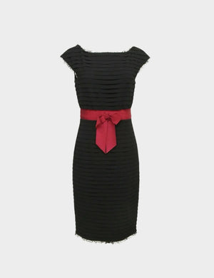 Chanel black textured sheath dress with red sash belt and bow.

