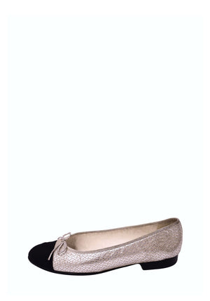 Chanel metallic champagne gold textured leather ballet flat featuring a scale-effect pattern, contrasting black cap toe, delicate metallic bow, rounded toe, and low stacked heel