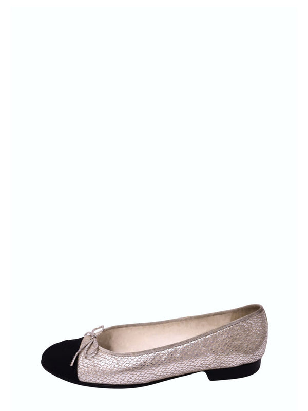 Chanel metallic champagne gold textured leather ballet flat featuring a scale-effect pattern, contrasting black cap toe, delicate metallic bow, rounded toe, and low stacked heel