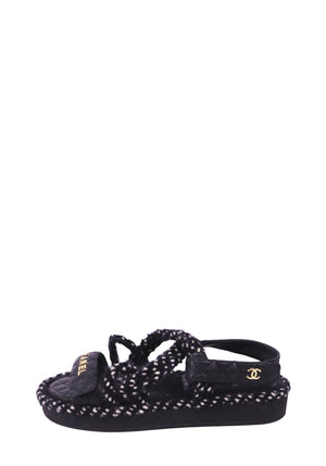 Chanel black quilted sport sandals with gold logo detailing and textured black-and-white woven trim