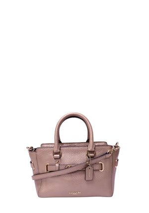 Coach Swagger 21 metallic rose gold pebble leather satchel with top handles and detachable crossbody strap