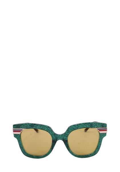 Gucci oversized square sunglasses with green frame and yellow lenses featuring web stripe detail