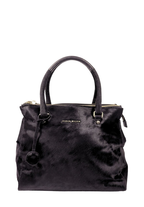 Karen Millen black pony hair tote bag with gold-tone hardware and top handle