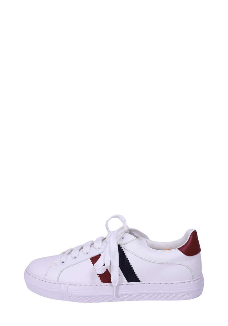 Moncler white leather low-top sneakers with red and navy stripe detail and lace-up design