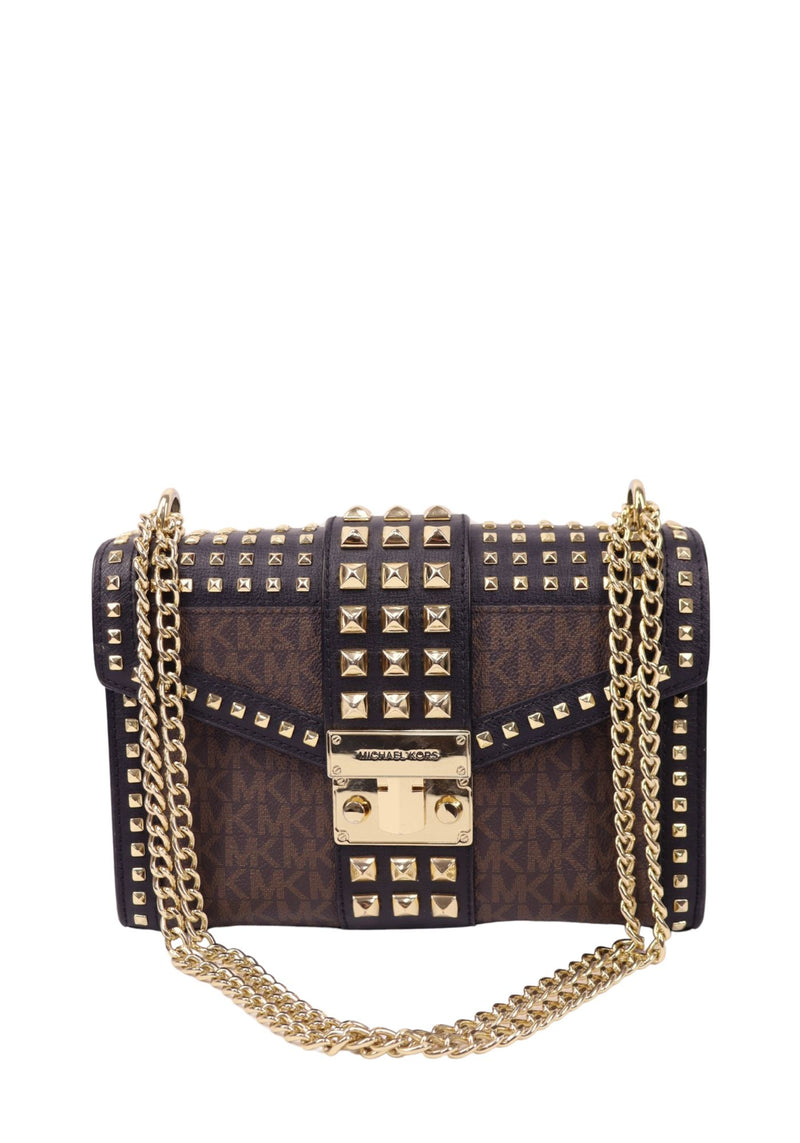 Michael Kors brown monogram shoulder bag with gold-tone studs, chain straps, and structured lock-front closure.