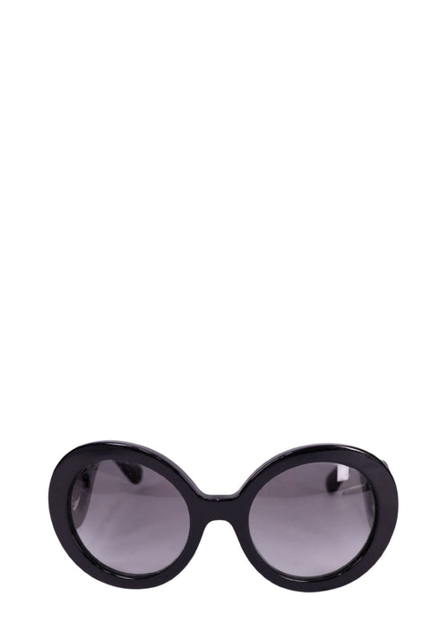 Prada black baroque sunglasses with oversized round lenses