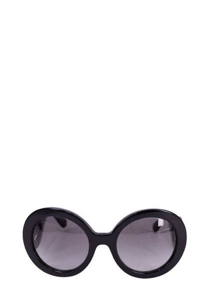 Prada black baroque sunglasses with oversized round lenses