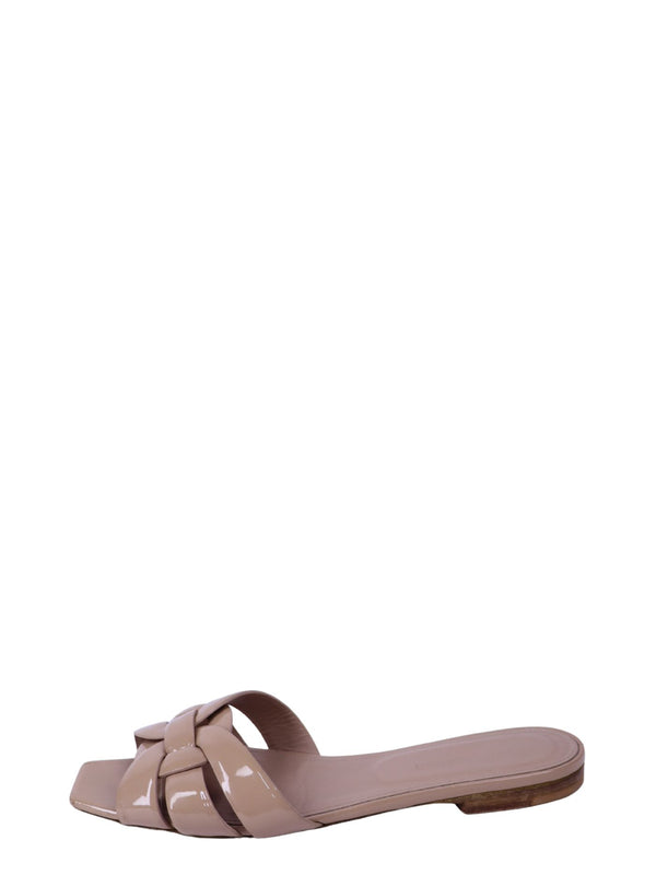 Saint Laurent nude beige patent leather slide sandals with woven strap detail and square toe design