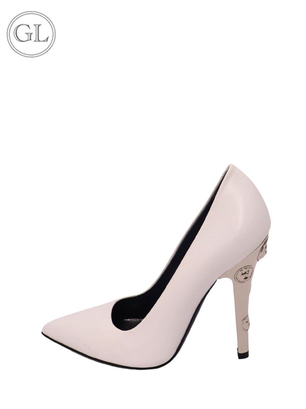 Versus Versace white leather stiletto pumps with pointed toe and medallion-embossed sculptural heel.

