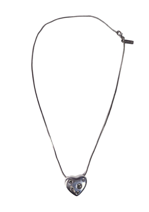 Saint Laurent silver tone heart pendant necklace with crystal embellishments and fine chain detailing.