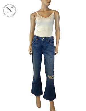 "Edwin blue flare jeans with distressed knee and classic five-pocket design"

